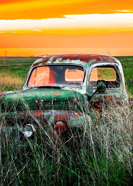 Old rusty truck on the prairie at sunset painting art