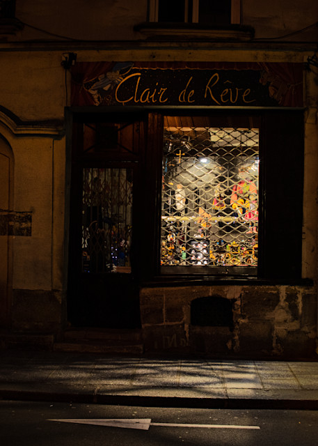 Where Paris Sleeps - Dreamlike Light - A closed shop provides dreamy light for the ancient city - Fine Art Photo Print