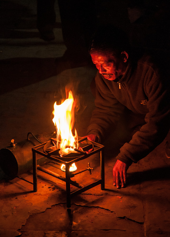 Man Lighting Stove - Kathmandu, Nepal