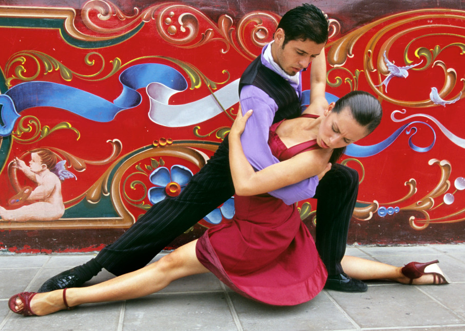 Tango art dancer in extreme pose in front of colorful mural, photograph print.