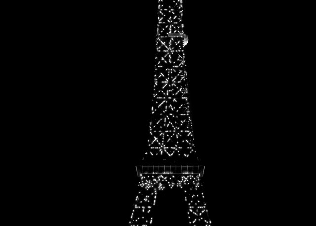 Eiffel tower at night with white lights, , black and white art photograph