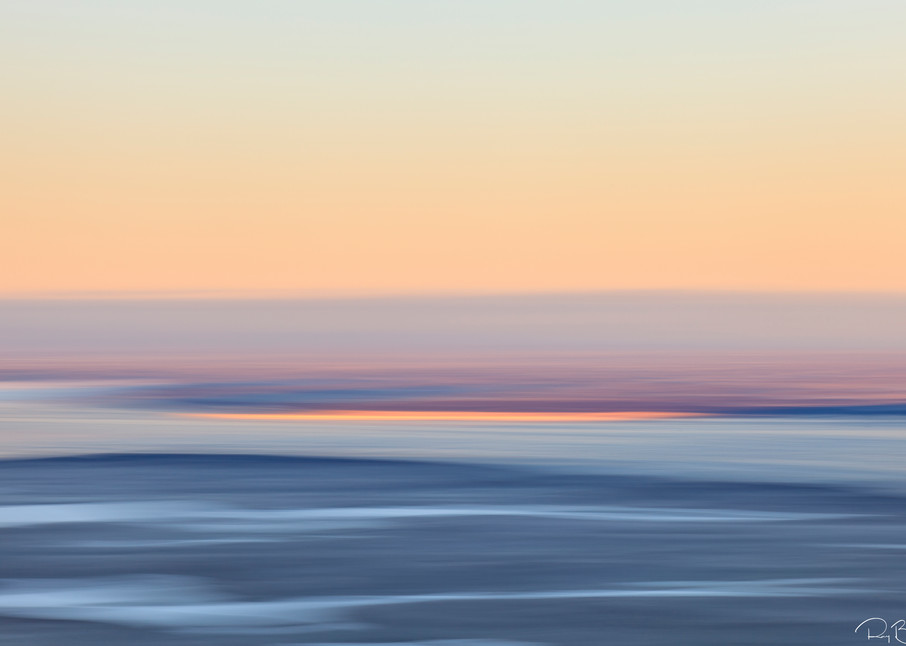 Motion blur of Eagle River Flats in foreground with snow covered lakes, Knik Arm, and Susitna Valley in background during sunrise from Eagle River in Southcentral Alaska. Winter. Morning.