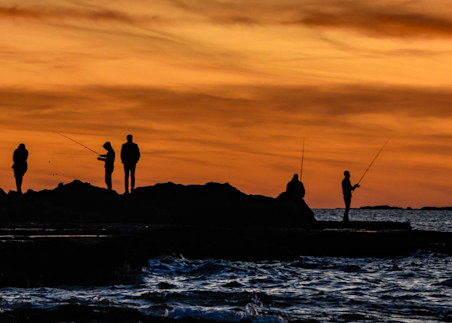 Sunset fishermen pano