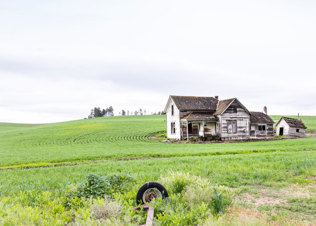 Abandoned Farmhouse and Wheel base in the Palouse