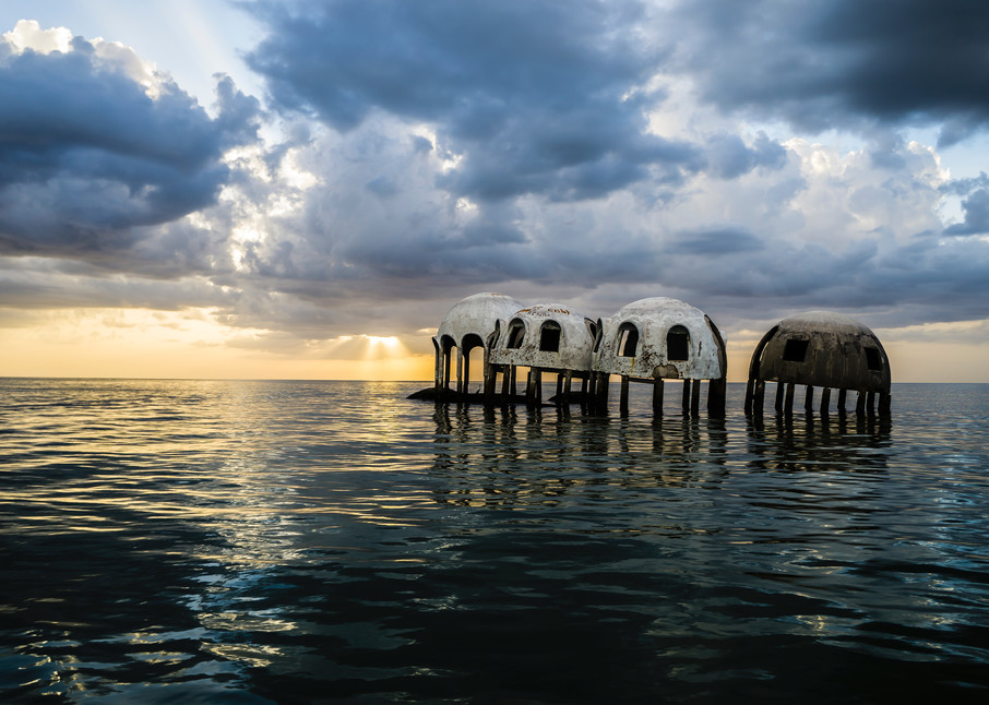 Cape Romano Sunset features the famous dome home, an abandoned structure slowly sinking into the Gulf of Mexico. 