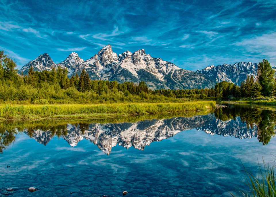 Beautiful reflection at Schwabacher Landing in Grand Teton National Park. This is a much photographed location, but the reflection and light in this image was the nicest that I captured in several visits here.