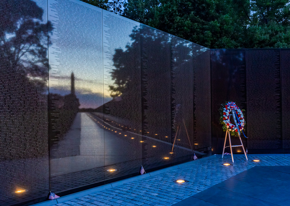 Vietnam Memorial with Reflection of Washington Monumnent at Sunrise