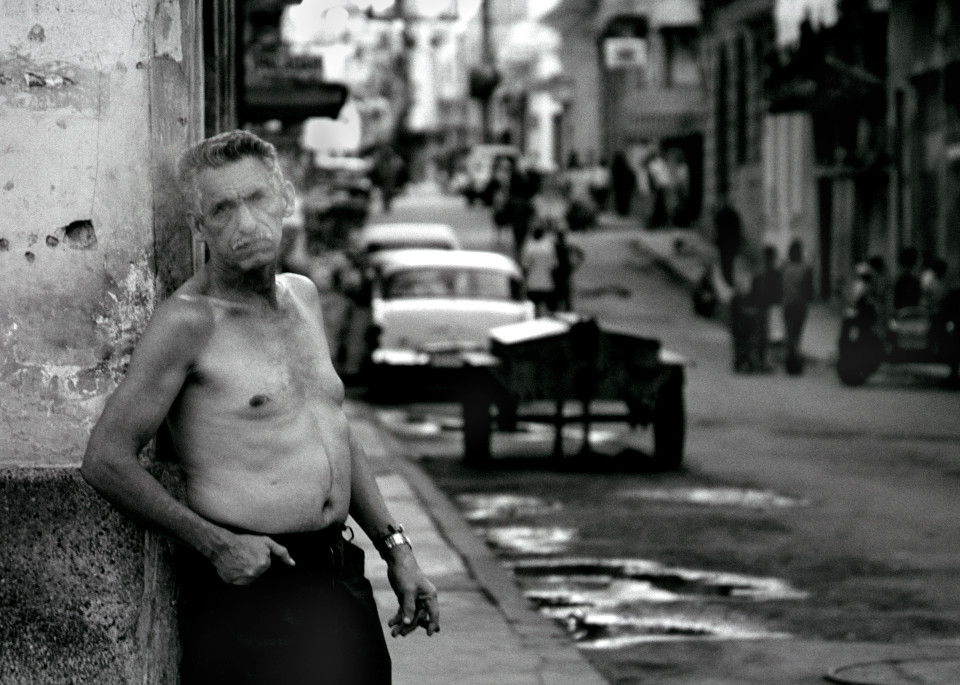 Havana Cuba man smoking cigar 1950s cars
