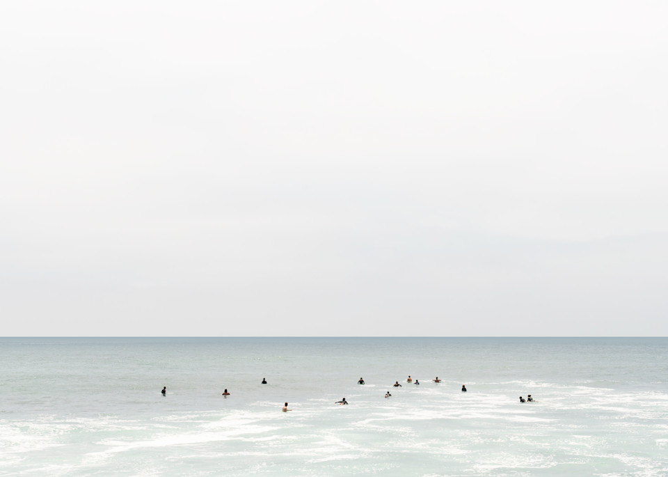 Fine art photograph of surfers in the water at Windansea beach in San Diego, California