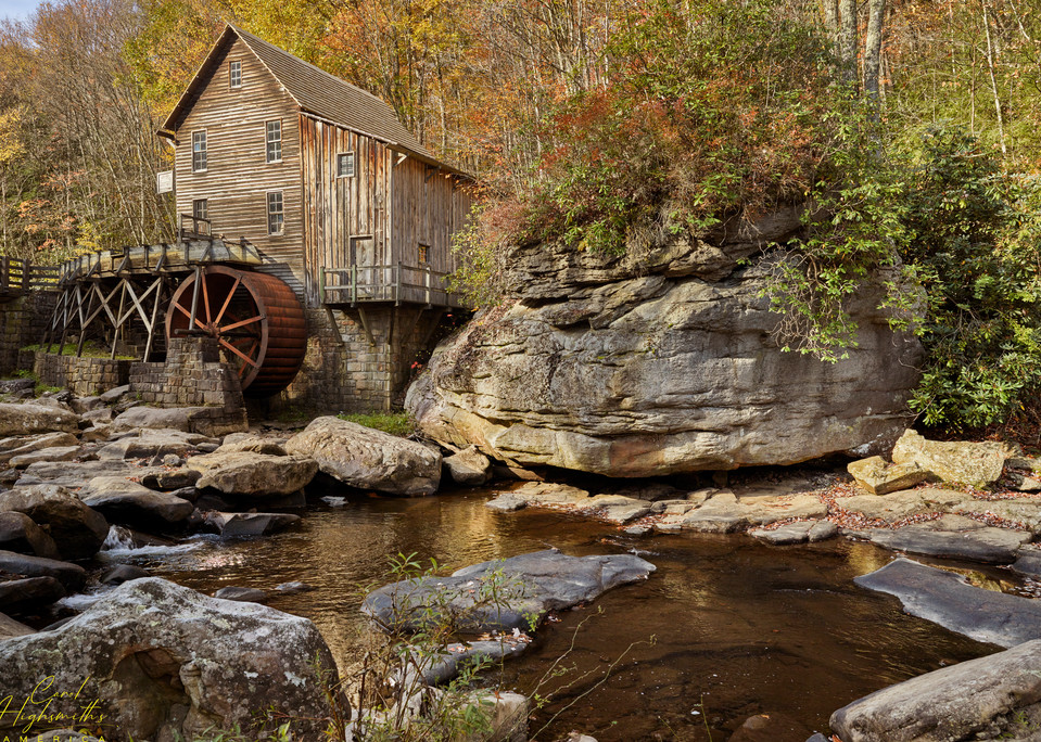 The Glade Creek Grist Mill, a fully operable mill was built in 1976 in West Virginia's Babcock State Park as a recreation, made from parts of three old mills, of Cooper's Mill, which burned to the ground in the 1920s andground grain on Glade Creek l