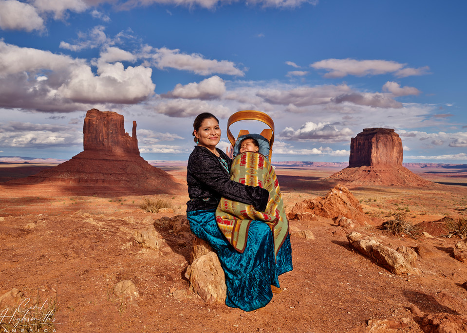 Navajo tribal member Monument Valley Eula M. Atene and 3 month old boy Leon Clark, holding her infant child, poses in Monument Valley, a red-sand desert wonderland that is part of the Navajo National Tribal Park on the Arizona-Utah border.  Renowned