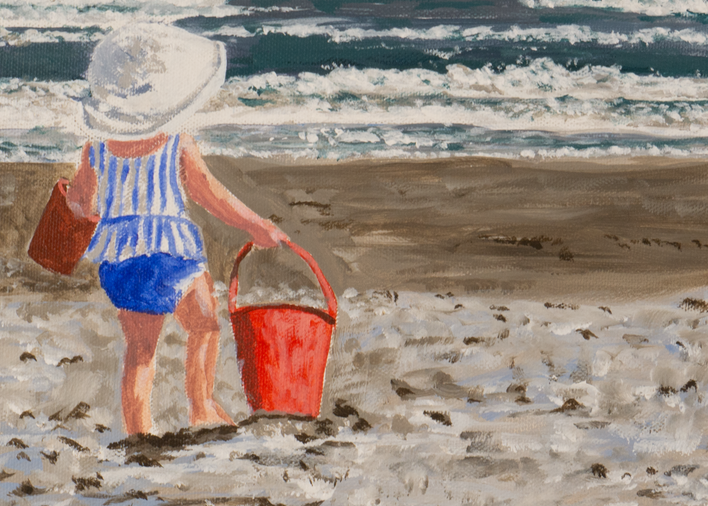 Baby on Beach with Red Bucket
