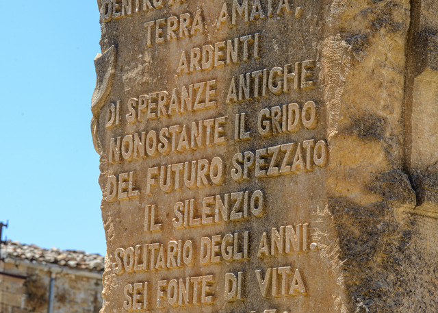 Inscription on eight foot baroque statue artifact in Poggioreale, Sicily in 2019