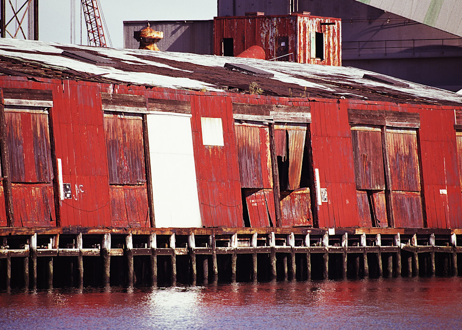 LOST IN BROOKLYN: The Red Pier

The red pier was located at the end of Hoyt Street in the Gowanus Canal. It had a stark beauty that came from the streaked red paint, filled with rust. To me, it was a graphic symbol of how the canal had been abando