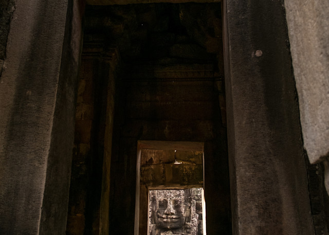 Buddha's face through temple doorways