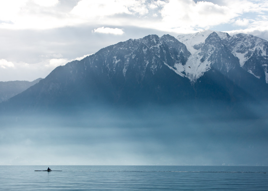 Fine art landscape photograph of a rower at Lake Geneva, Switzerland by Allison Davis