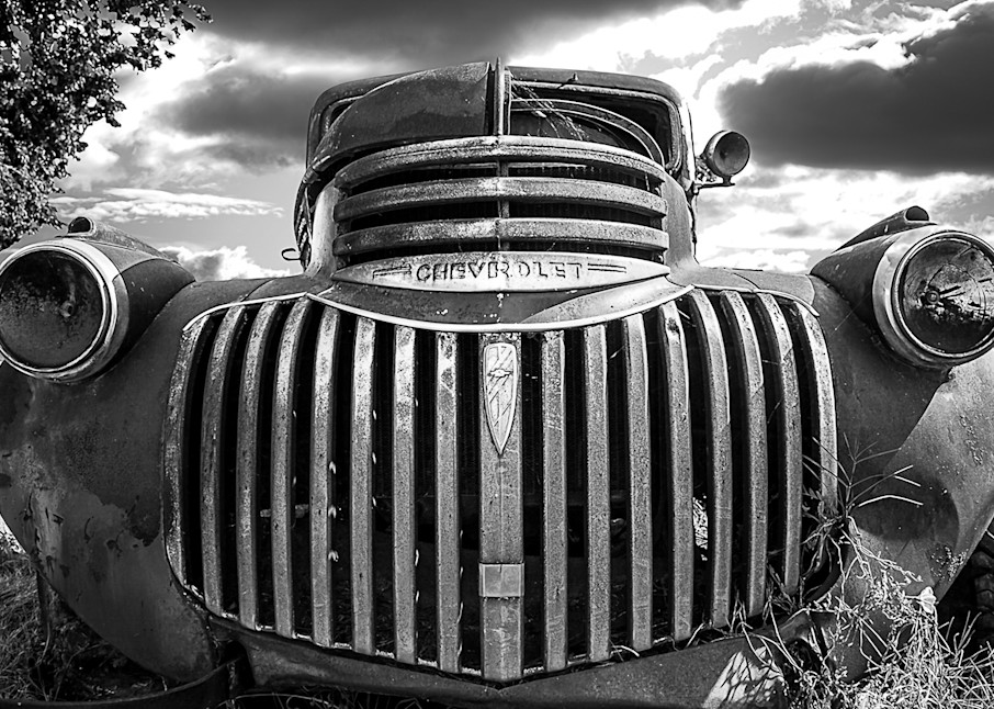 This old Chevy truck was photographed sitting in a field on the way to an old sugar mill. 