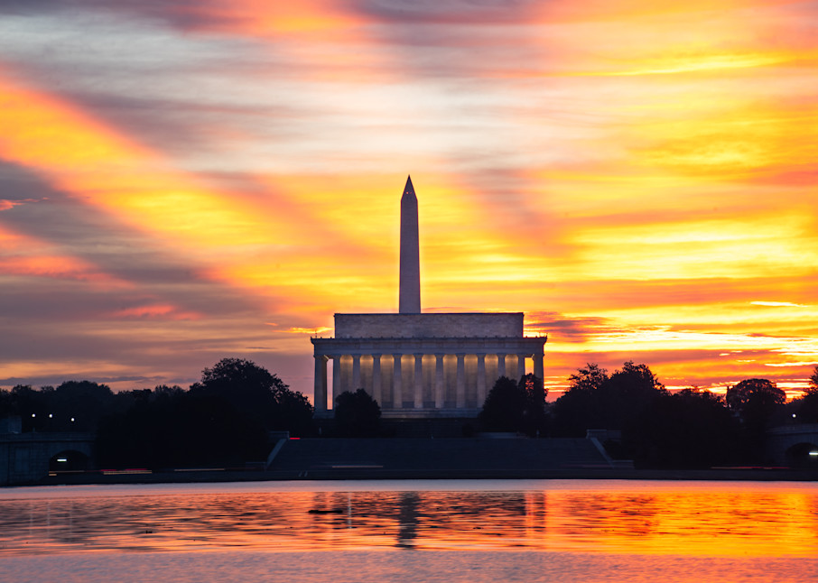 Morning sun rays backlight the Washington and Lincoln Memorials in Washing DC along the Potomac - Fine Art Print