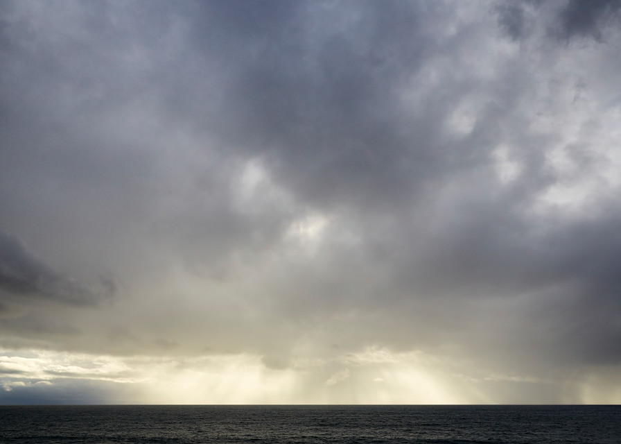John E. Kelly Fine Art Photography – Backlit Rain - Image 16 (sixteen) - Ocean Sky