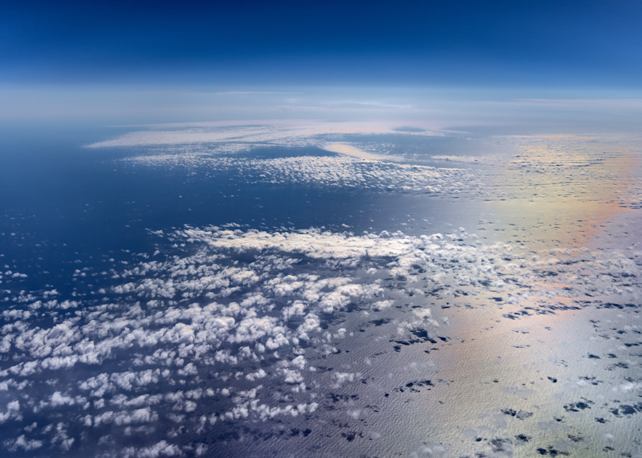 Above Mottled Clouds Photograph