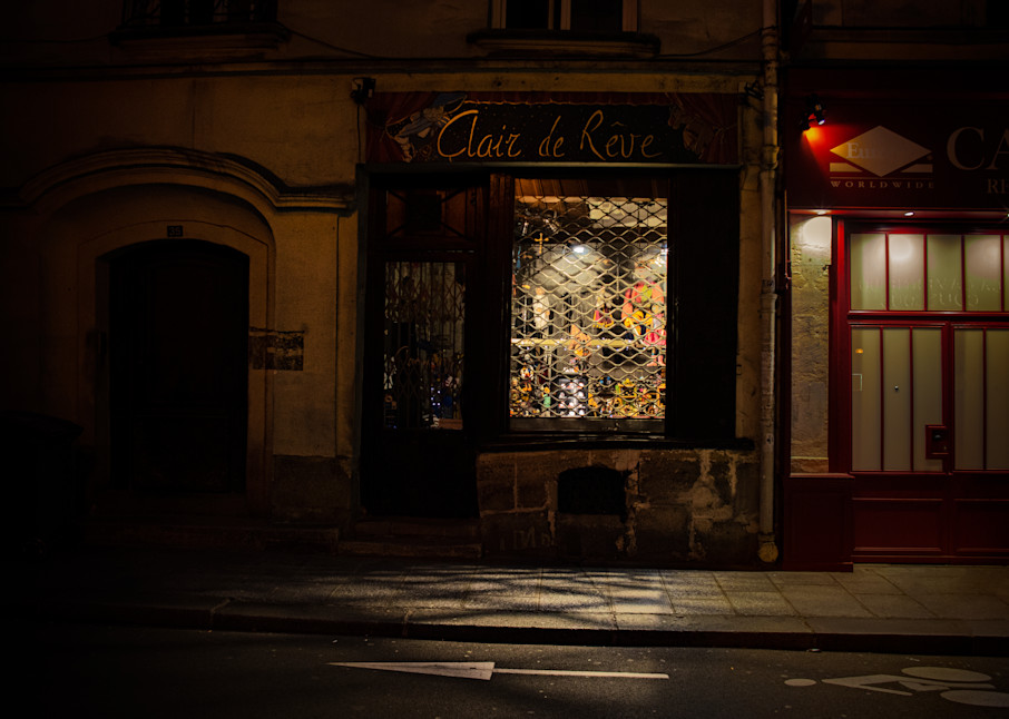 Where Paris Sleeps - Dreamlike Light - A closed shop provides dreamy light for the ancient city - Fine Art Photo Print