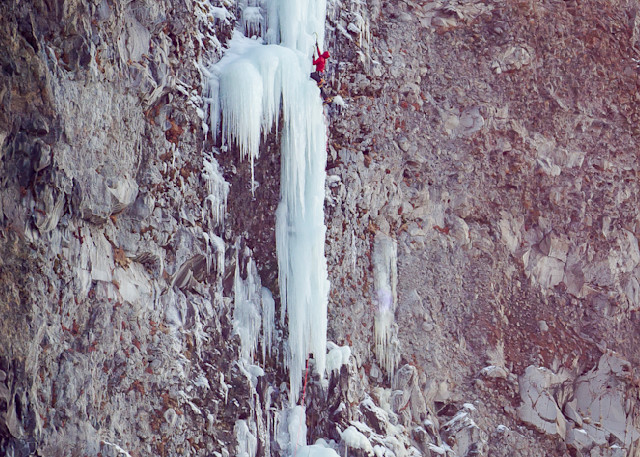 Justin Griffin and Kyle Dempster climbing the Hyalite classic "Winter Dance" in Hyalite Canyon.