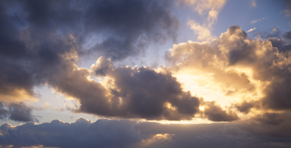 Discover the fine art of the morning sun breaking through clouds by Greg Probst