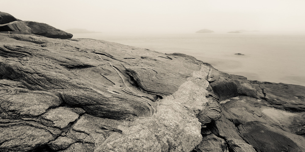 A panoramic view in sepia tone of the foggy CT coast at Waterford Beach.