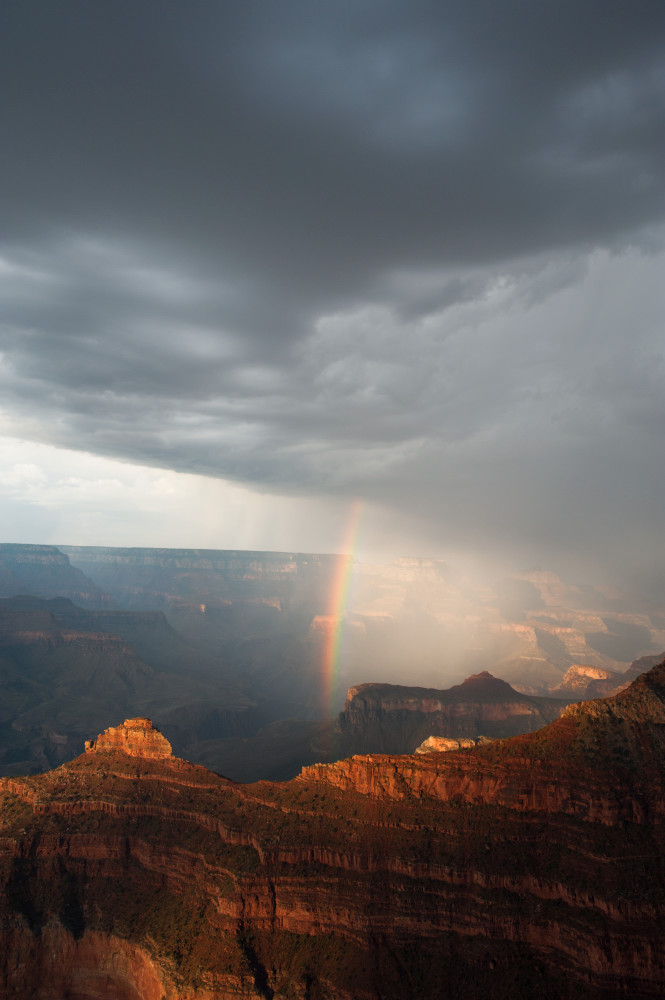 Fine art print of a rainbow and the grandeur of Grand Canyon by Greg Probst
