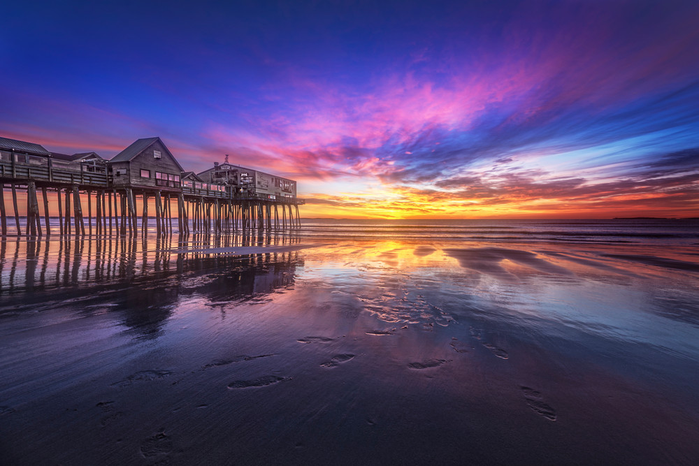 Old Orchard Beach Sunrise, the sky lights up behind the Pier at Old Orchard Beach, Maine