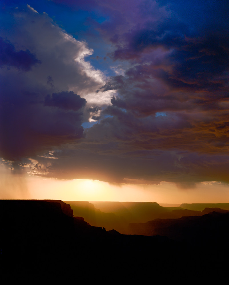 Grand Canyon with a breaking monsoon storm at sunset