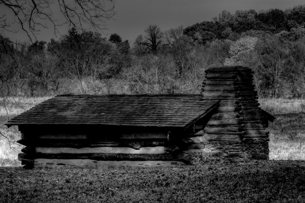 A Black and White Fine Art Photograph of a Valley Forge Military Hut by Michael Pucciarelli