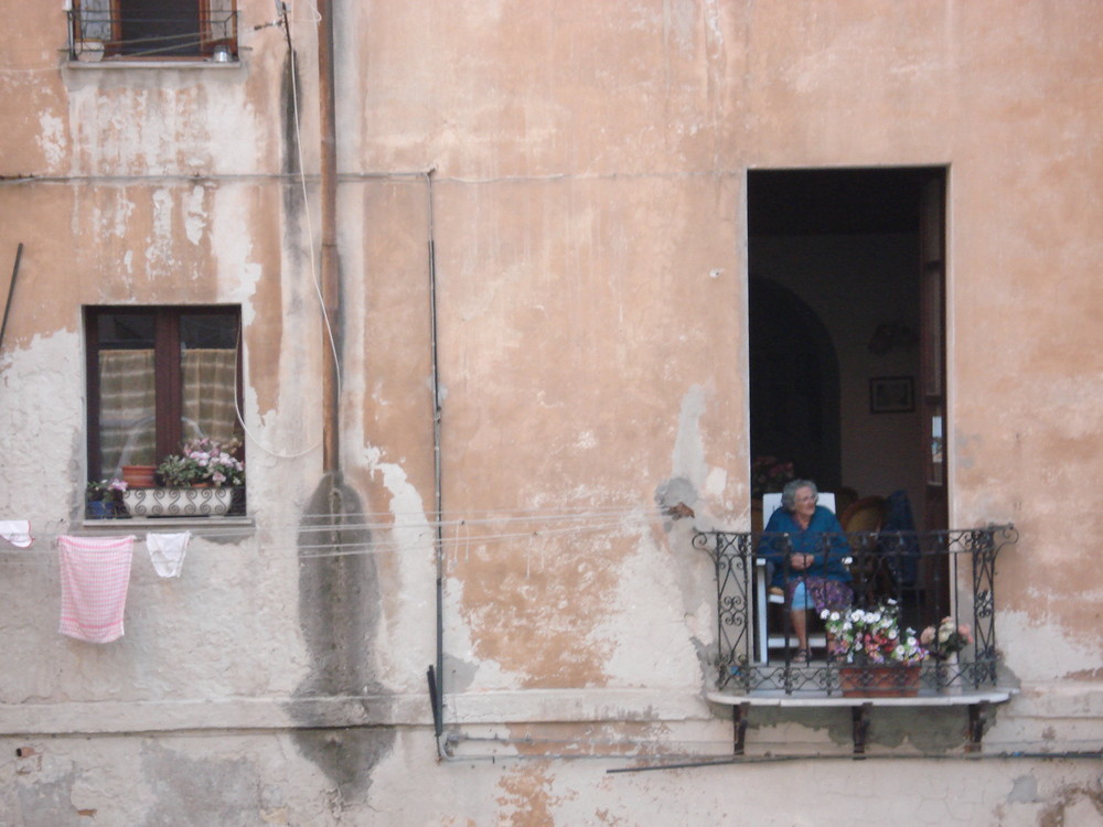 italy grandma sardinia streetscene neighbor