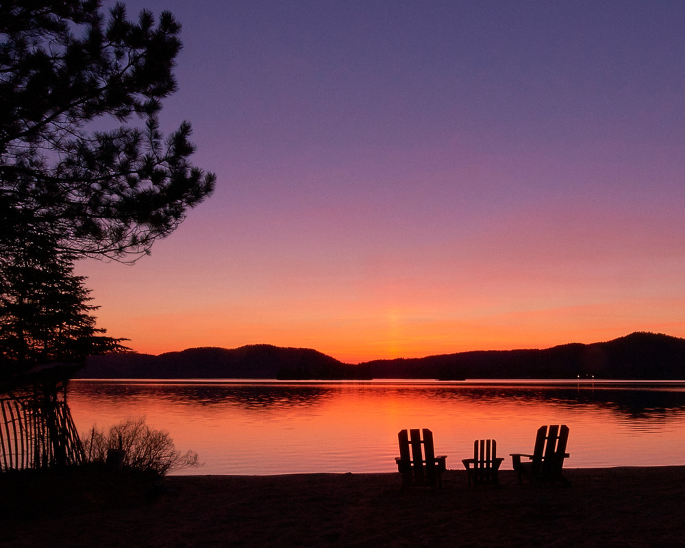 4th lake sunset with adk chairs in the Adirondacks