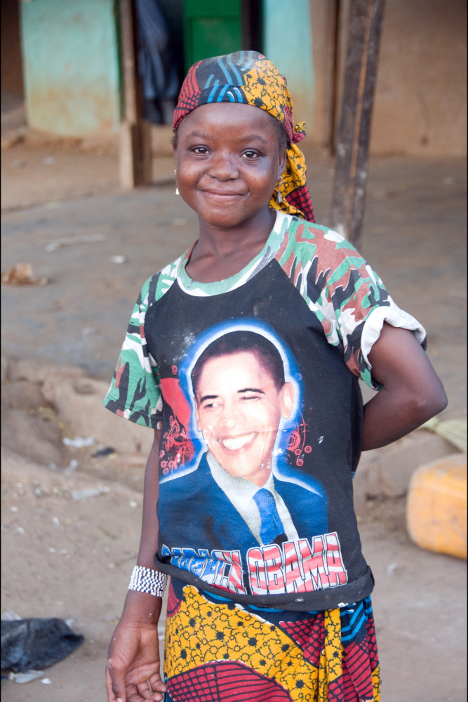 Girl with traditional African skirt and bandana wearing Obama tee-shirt, fine art photograph