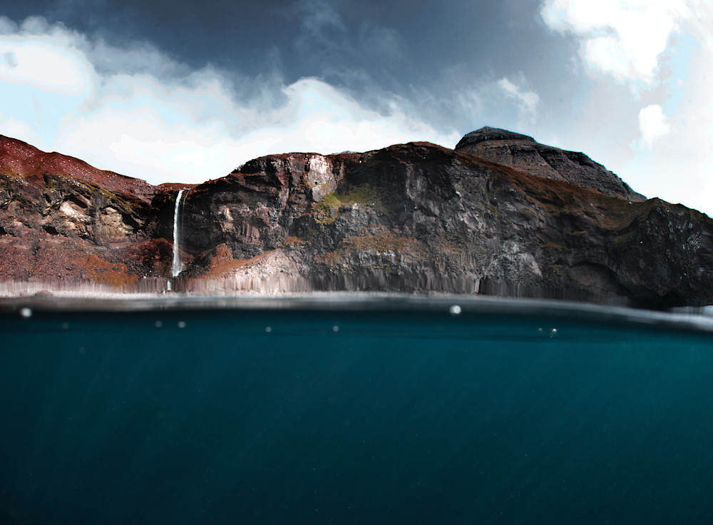 photography of a water fall in the Faroe island 