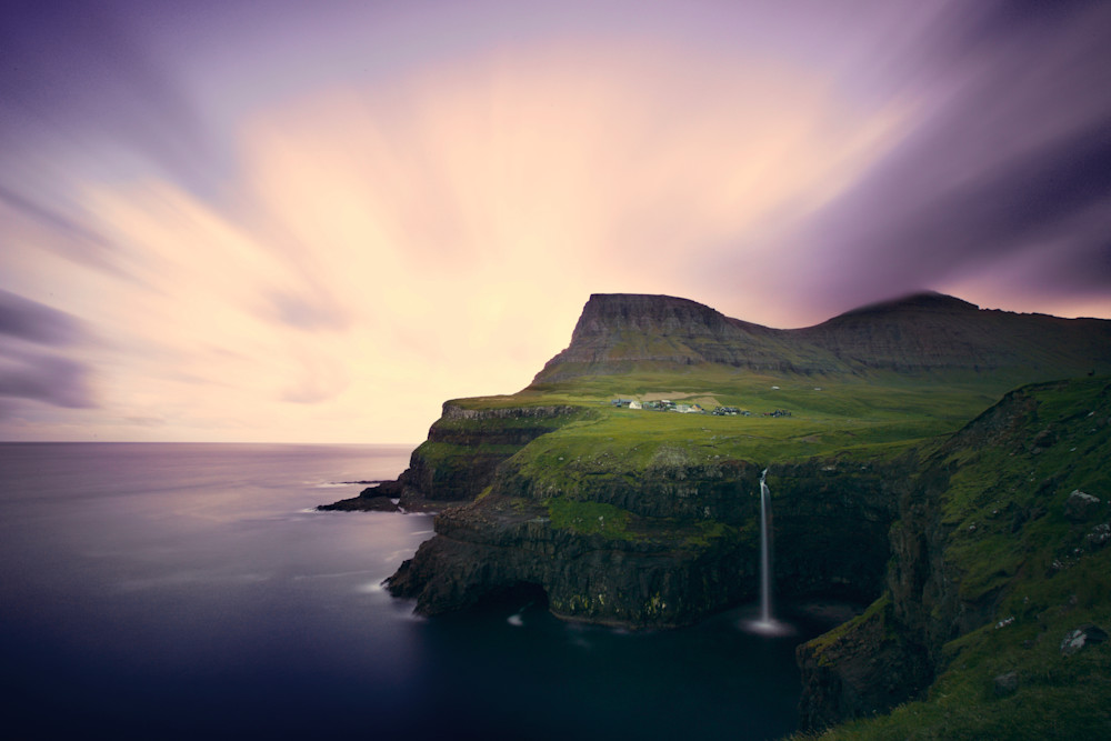  photography of a Village and the waterfall in the Faroe islands 