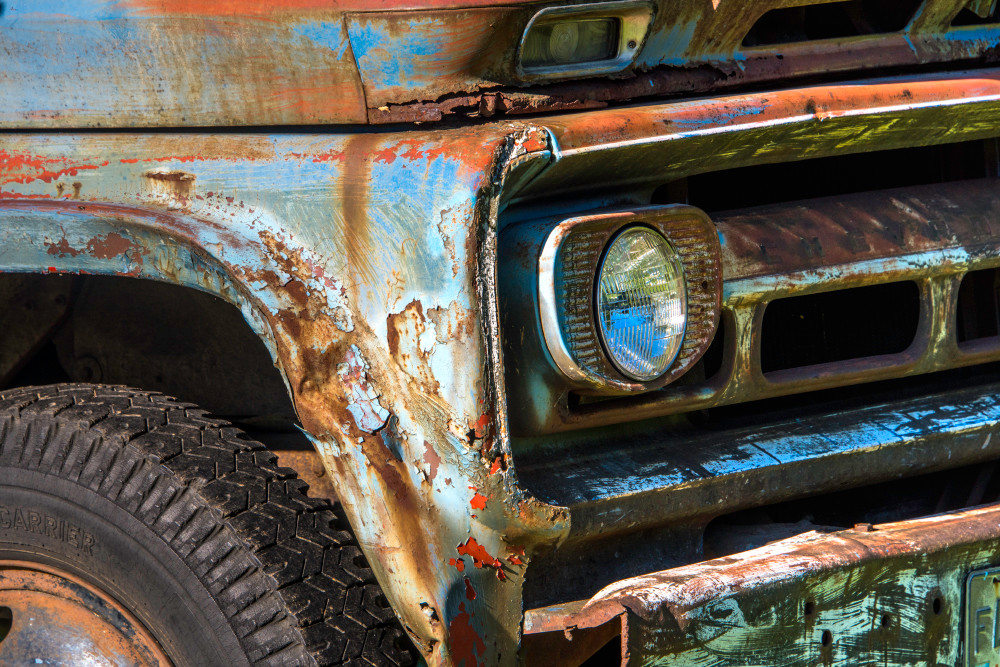 Close up of colorful rusty old truck in art photograph