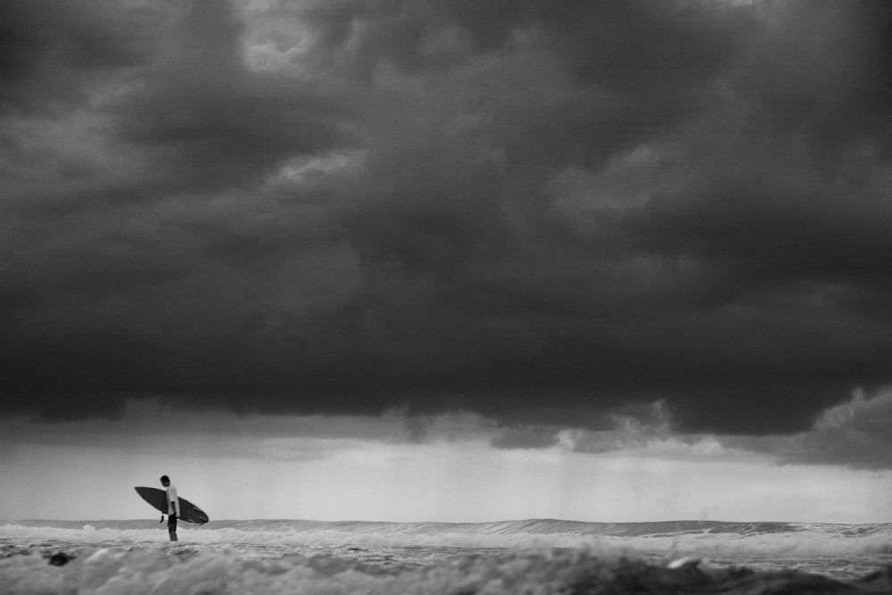 surfer and clouds