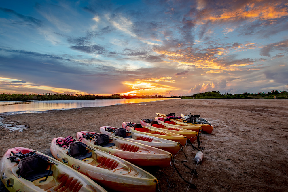 Kayaks At Sunset