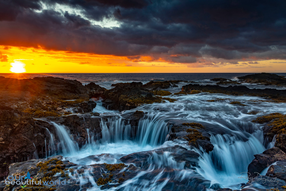 Heartbeat of the Sea features a double lava tube drain on Hawaii at sunset