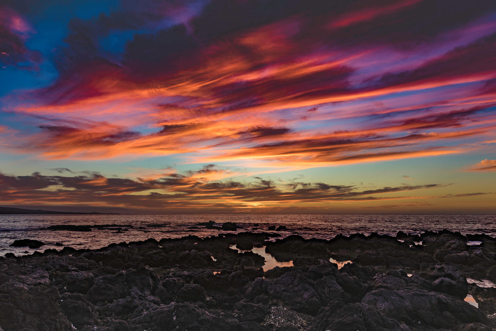 The shore pulls you Into the Sunset in this image from Hawaii.