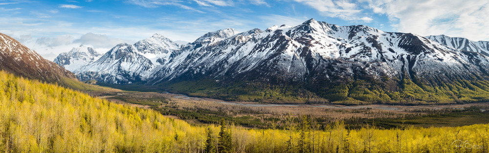 Composite panorama of Polar Bear and Eagle Peaks and Hurdygurdy Mountain overlooking Eagle River Valley in Chugach State Park in Southcentral Alaska. Spring.