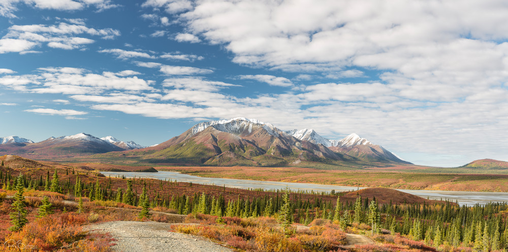 Composite panorama of the Susitna River and the Talkeetna Mountains south of the Denali Highway in late autumn in Southcentral Alaska. Morning.