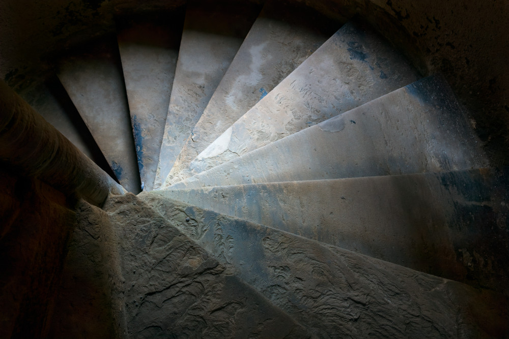 Color photograph of circular steps in tower, Linlithgow Palace Ruins, Linlithgow, Scotland.