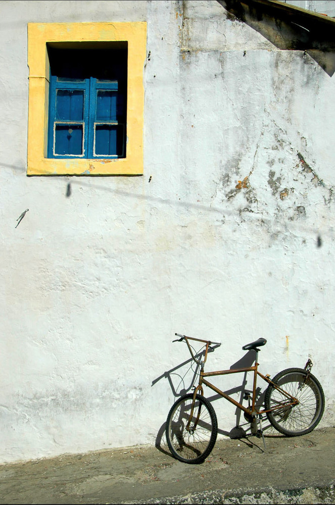 Bike under colorful window