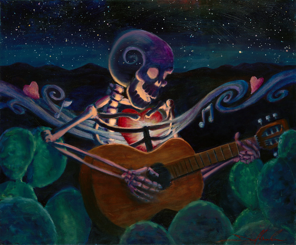 Daniel Gonzalez painted this skeleton with a big heart playing the guitar in the desert night among the stars. 