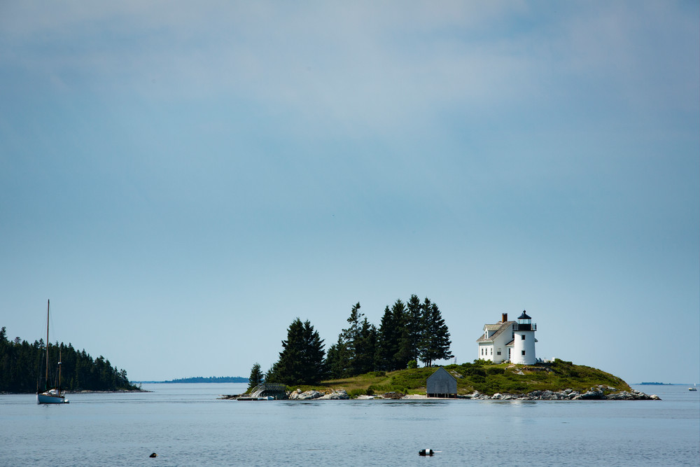 Pumpkin Island, ME -10 August 2014. Pumpkin Island Light, at the northern end of Eggemoggin Reach. The lighthouse is decommissioned, as is in private hands.