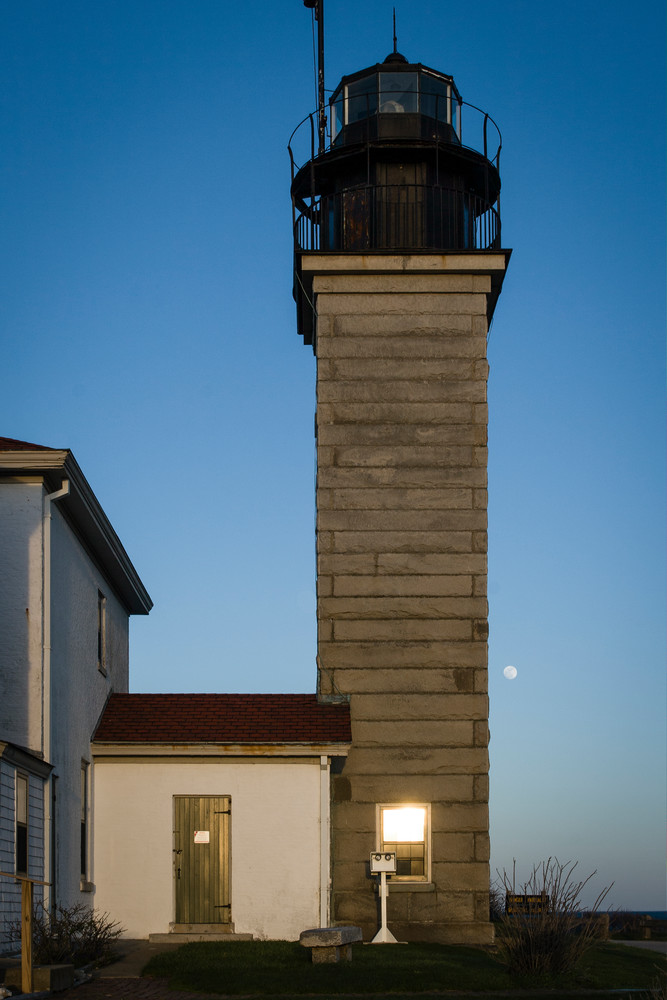 Beavertail Lighthouse in Jamestown, Rhode Island, at sunset. The first  lighthouse was built on this spot in 1749; the present lighthouse dates to 1856.