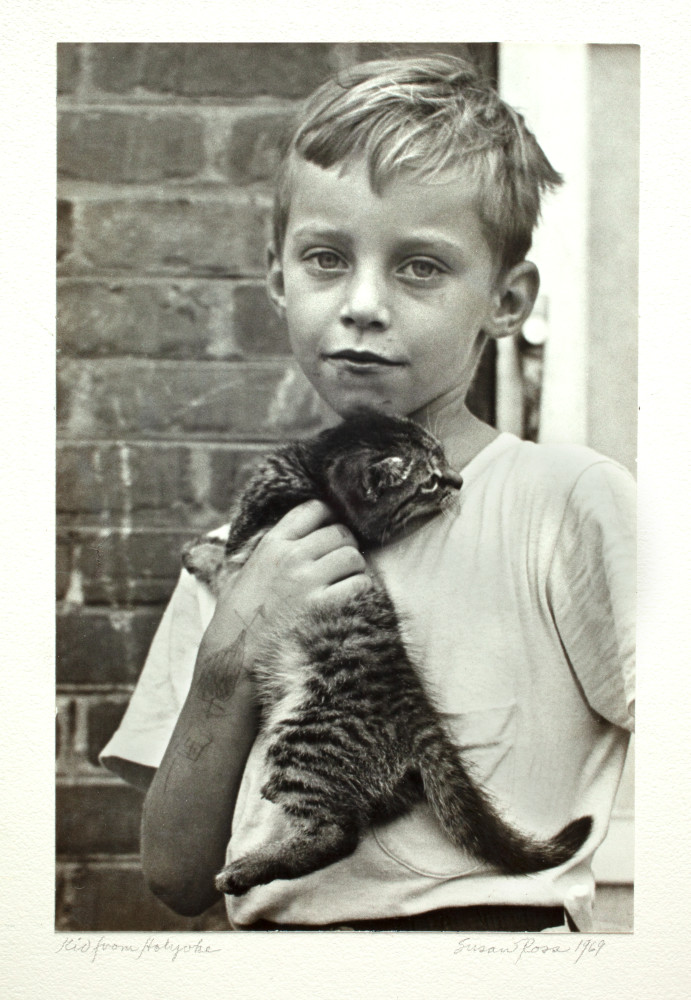 Photograph of Kid with Cat